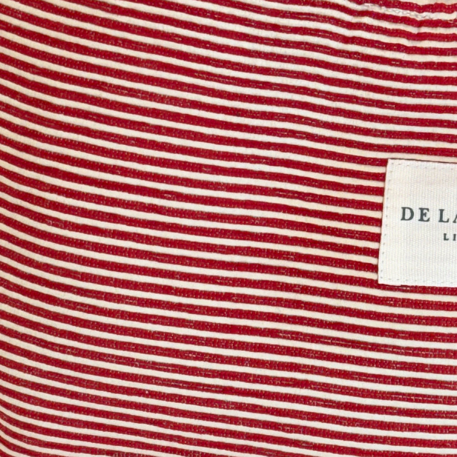 Detalle del estampado de rayas y etiqueta De La Mur Lime.