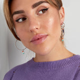 Aros plateados twisted con perla y piedra verde — estilo boho