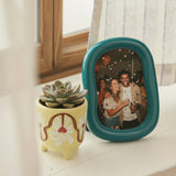 Marco de fotos redondo azul