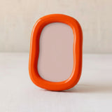 Marco de fotos redondo naranja