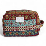 Neceser mediano de jacquard multicolor con etiqueta De La Mur, vista frontal.