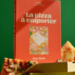 Caja roja del puzzle de 1000 piezas sobre cajas de pizza recicladas.
