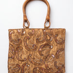 Imagen 1: Bolso vintage dorado con estampado cachemir, bordados y asas de madera.