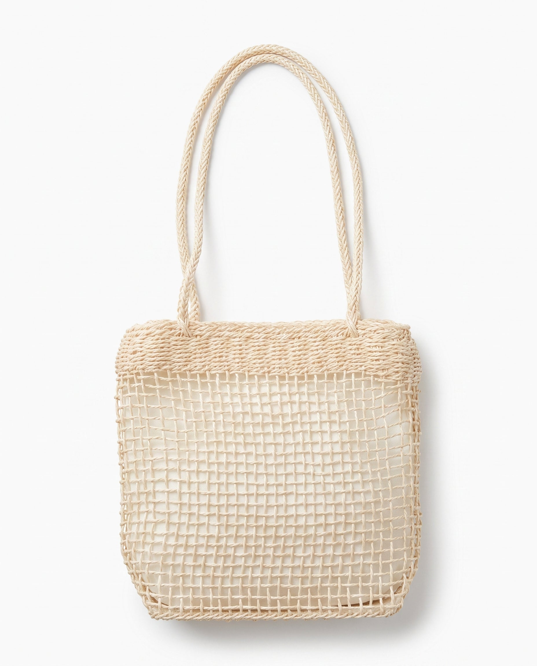 Bolso vintage de fibra sintética trenzada color crema, vista frontal.