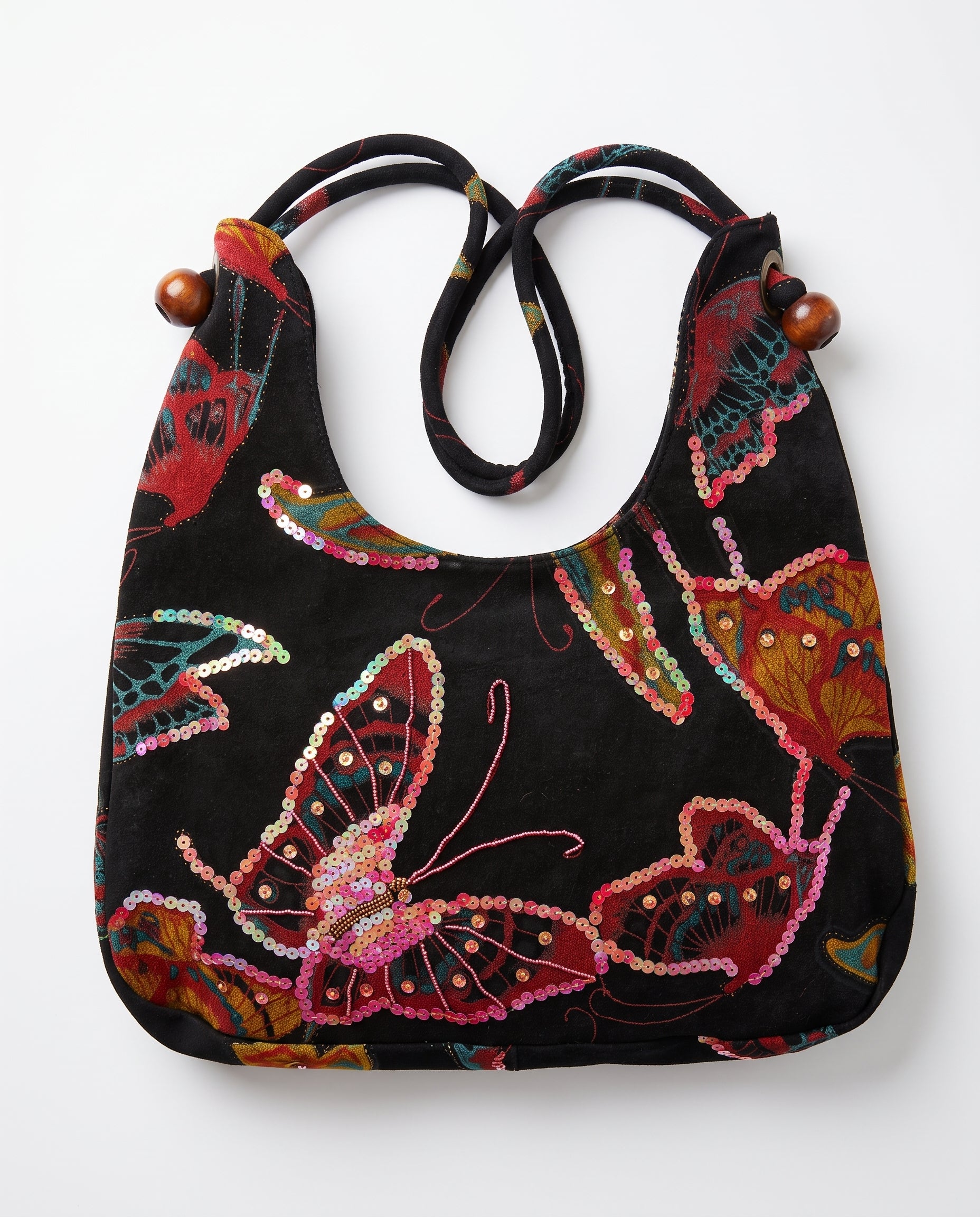 Bolso vintage negro con estampado de mariposas y detalles de lentejuelas de colores.