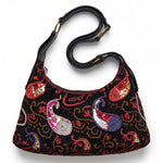 Bolso vintage negro de hombro con bordados de lentejuelas y motivos ornamentales.