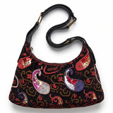 Bolso vintage negro de hombro con bordados de lentejuelas y motivos ornamentales.
