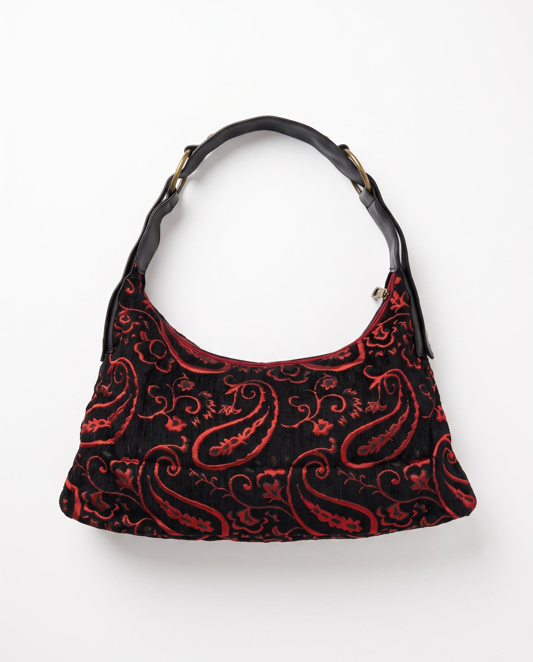 Vista trasera del bolso vintage negro bordado.