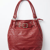 Imagen 1: Bolso vintage de piel roja nuevo a estrenar con hebilla decorativa.