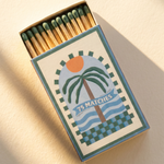 Caja decorativa de cerillas largas A Dopo con diseño inspirado en el Mediterráneo.