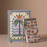 Cuaderno Palm Beach junto al bloc de notas de la misma colección.