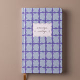 Cuaderno de tapa dura Blue Lattice Tulip con estampado geométrico azul.