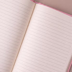 Interior del cuaderno Palm Beach con páginas rayadas para escritura.