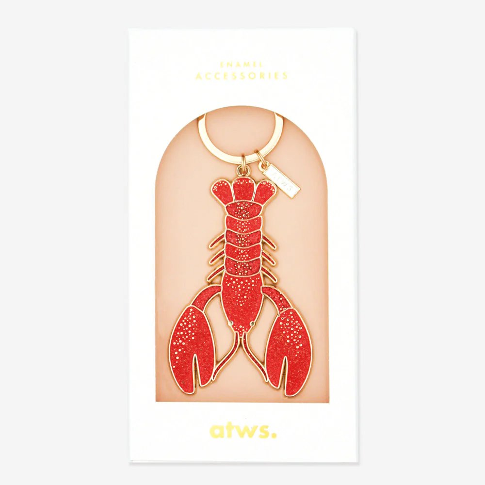 Llavero esmaltado de langosta en rojo con detalles dorados, un accesorio original de All The Ways To Say