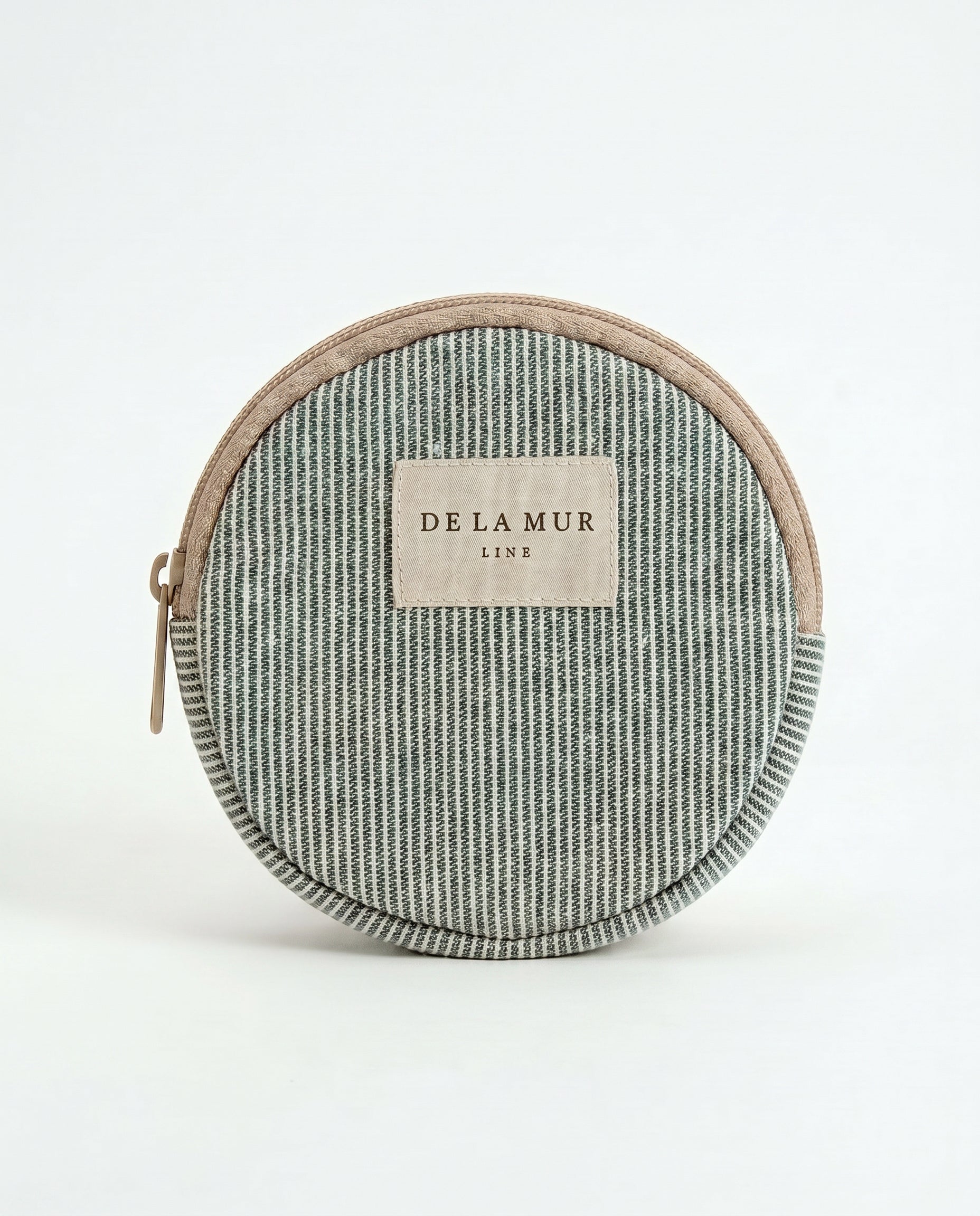 Monedero redondo de jacquard verde agua, vista frontal.