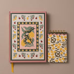 Cuaderno ilustrado con serpiente y bloc de notas a juego del pack Snake Garden.