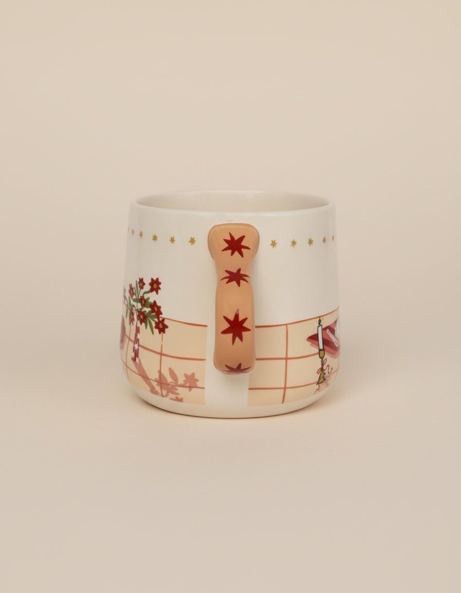 Detalle del diseño ilustrado de la taza cerámica Dinner Party con elementos decorativos.