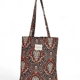 Tote bag con estampado retro en tonos caldera y asas largas, vista frontal