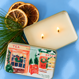 Vela de soja PADDYWAX abierta con dos mechas en recipiente metálico decorativo navideño.